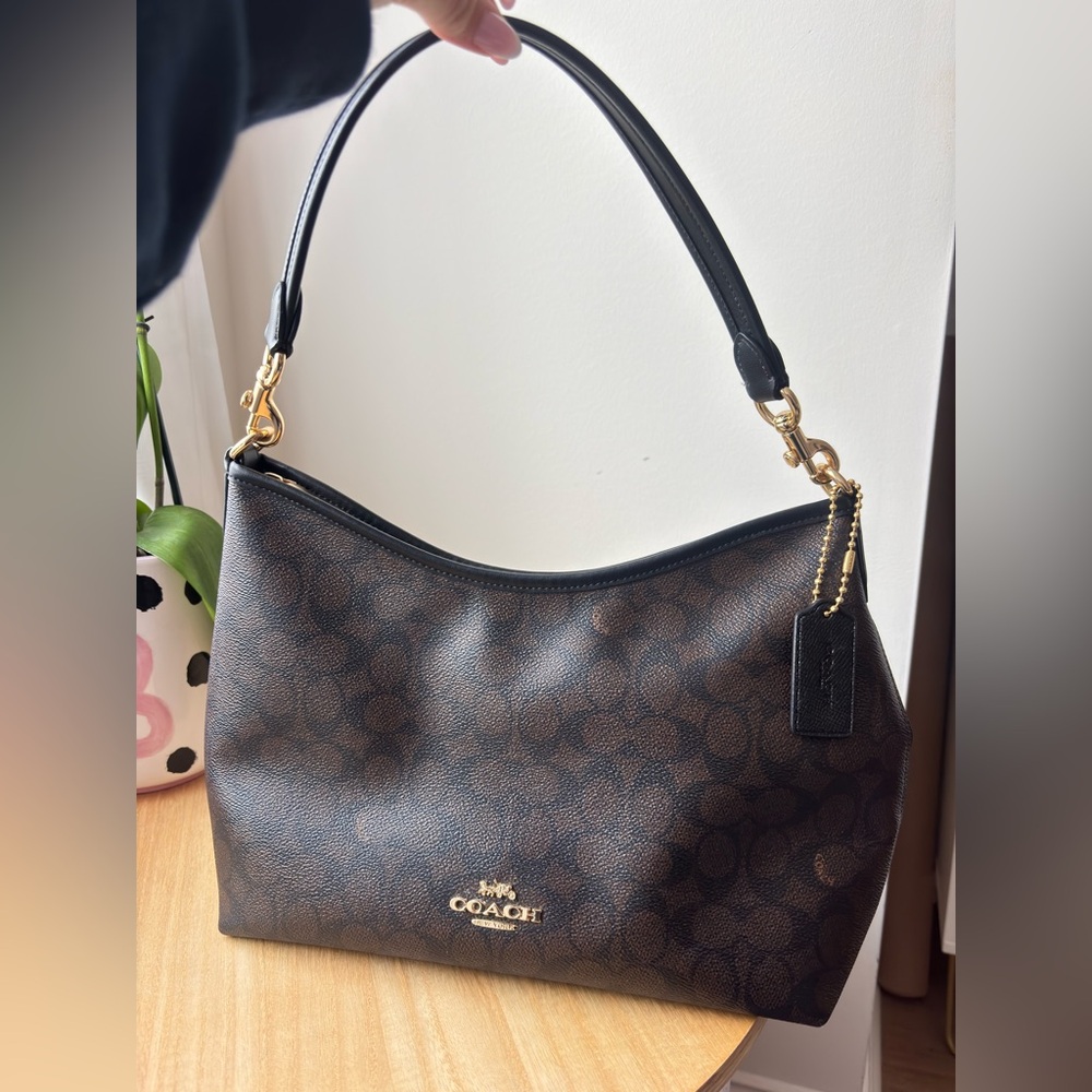 Coach medium laurel bag in black and walnut with signature canvas